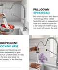KRAUS Bolden 2-in-1 Pull Down Kitchen Faucet with Integrated Water Filter Tap for Reverse Osmosis or Water Filtration System in Spot-Free Antique Champagne Bronze/Matte Black, KFF-1610SFACBMB showing pull-down sprayhead in action over a bowl of strawberries.