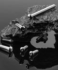 Rock Solid 1/4-20 X 2-3/4 Inch Button Head Socket Cap Bolts arranged on a textured surface, featuring stainless steel finish.