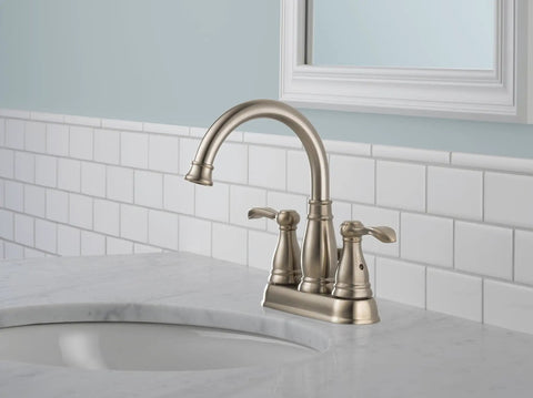 Porter Two Handle Centerset Bathroom Faucet In Brushed Nickel With Mid Arc Spout 7 Inch High, 5 Inch Reach, Easy Grip Lever Handles