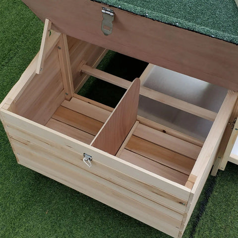 Close-up of the hinged nesting box in the No Sweat Wooden Chicken Coop With Hinged Nesting Box And Removable Egg Tray.
