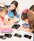 Children using Flower Scratch Card Craft Kit For Kids Featuring 60 Cards In Two Styles With 20 Wooden Styluses And Pink Ribbon