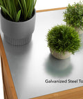 Top view of Outdoor Garden Potting Bench with metal tabletop and plants