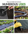 Galvanized Garden Stakes Kit 6 Inch 11 Gauge Includes 100 Landscape Staples 100 Gaskets And 1 Pick Hook For Tent Stakes Weed Barrier Landscape Fabric Ground Cover Fence in use for securing garden fabric and hoses.