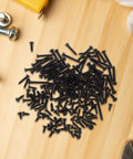 All In One Self Tapping Screws Kit With Carbon Steel 450pc Assortment on wooden surface with tools