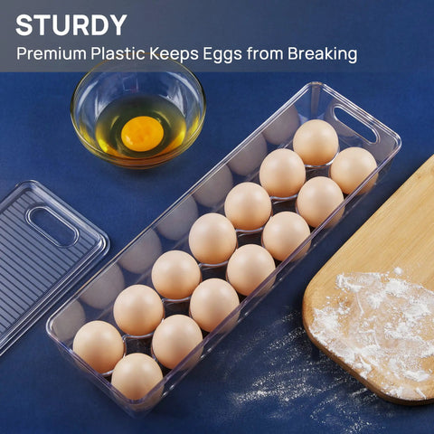 Clear Stackable Egg Organizer For Fridge Fits 14 Eggs BPA Free Plastic Storage Bin For Fridge Organization Durable No Mess Crystal Clear Tray Set 2 Pack Bundle with eggs displayed next to bowl and cutting board.