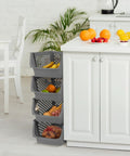Four stackable gray storage bins next to a kitchen island with fruits, featuring Stackable Plastic Storage Bins 4 Piece Gray Set For Home