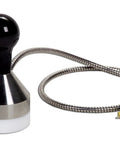 Weighted Griddle Surface Thermocouple Probe Type K For Grills And Flat Tops Minus Forty To Five Hundred Degrees Fahrenheit Range Ultra Fast Two Second Read Time On Oiled Surfaces 2.5 Inch Diameter Flexible Armor With PTFE Coated Shaft, showing probe with black handle and coiled cable