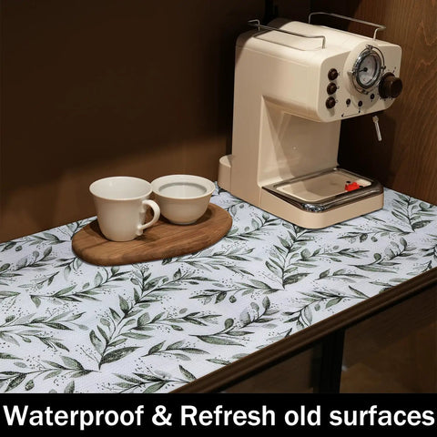 Top Shelf Non Adhesive Shelf Liners For Pantries Drawers And Closets With Nonslip Texture Durable Material Easy To Trim And Slide Into Place Every Single Time No Fuss Home Setup Game Changer on a kitchen countertop with coffee cups and wooden tray.