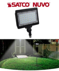 Six Pack Durable Led Outdoor Flood Lights Bringing Hella Serious Visibility To Any Space With Dependable 50 Watt Daylight Power And Vintage Bronze Casing Built For Smooth Patio Yard Garage Lot Mounting illuminated in a backyard garden.