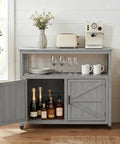 Wooden Patio Bar Table With Storage And Cedar Outdoor Buffet Cabinet Sideboard Serving Station With Double Layer Tabletop 42 Inch By 18 Inch For Patio Deck Backyard Indoor Use Durable Outdoor Bar Console For Entertaining with open cabinet showing bottles and a countertop with glasses, cups, and appliances.