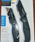 Built Different Utility Knife And Compact Pocket Cutter Set Featuring Hassle Free Extra Replacement Blades Super Grip Smooth Slicing Action Durable Daily Grind Work Gear with black nylon handles and two utility knives in packaging