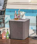 11.5 Gallon Waterproof Deck Box With Removable Lid And Faux Rattan Side Table For Outdoor Patio Storage All Weather Furniture And Extra Seating Poolside Brown next to pool with drinks on top