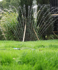 Heavy Duty Oscillating Sprinkler With 18 Brass Nozzles And Stable Metal Base For Big Yards Adjustable Flow Width And Coverage in use