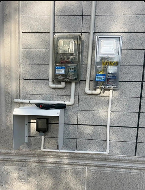 Beefed Up Wall Mounted EV Charger Weather Cover Rust Resistant Outdoor Armor For Home Plug In Station Rain Guard on wall.