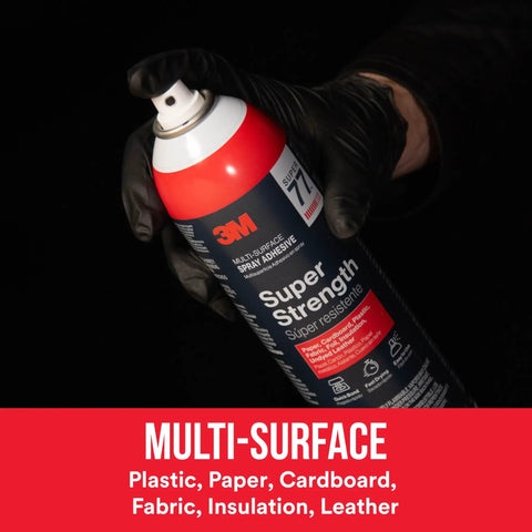 Person holding can of Multi Surface Spray Adhesive for light duty materials with fast dry time and low VOC, clear finish.