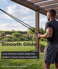 Solid Dual Sliding Wall Anchor Rail System With Adjustable Height For Resistance Bands And Suspension Trainers Made From Heavy Duty Aluminum in use outdoors.