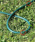U Shaped Galvanized Steel Ground Pins Garden Stakes And Staples fixing a garden hose on grassy lawn, 6 inch, 40 pack, green