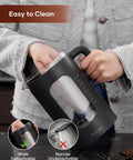 Person holding Glass Electric Tea Kettle With Tea Infuser And Precise Temperature Knob 1200W Fast Heating BPA Free Easy To Clean