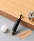 One Hundred Pack Heavy Duty Furniture Connector Kit With Rock Solid Zinc Cam Locks And Nylon Insert Nuts For RTA Cabinets Drawers And Beds Total Game Changer Build showing zinc cam lock, nylon insert nut, and wooden dowels.