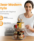 Clear Two Tier Lazy Susan Organizers Two Pack With Effortless Smooth Spin Turntable Silent Revolving Base Maximizing Vertical Counter Space For Spice Jars total kitchen game changer with spice jars on a wooden counter.