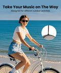Pocket Bluetooth Speaker With Big Bass, 5W Portable Wireless Speaker, IPX7 Waterproof, attached to a bike on a beach