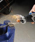 Zero Mess Spark Shield And Accessory Bundle For Rotary Tools Slick Spring Guard deflects sparks during rotary cutting in a vice.