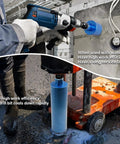 Person using wet diamond core drill bit for concrete with rebar and masonry, 4-1/2 inch cutter, 15 inch depth, in construction setting