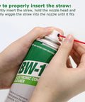 Close-up of hands pressing the BW-1 electronic cleaner aerosol can nozzle with red straw.
