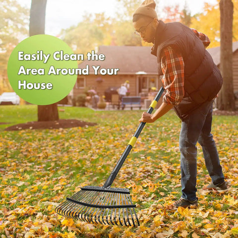 Heavy Duty Leaf Rake For Lawns And Yards With 65 Inch Adjustable Handle And 18 Inch Wide Head 25 Metal Tines in use