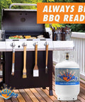 Grill setup with 30 Pound Steel Propane Tank Cylinder With Type 1 Overfill Protection Valve OPD for BBQ on wooden deck.
