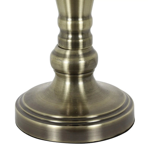 Close-up of brass base from Two Pack Antique Brass Table Lamp Set Built Tough Metal Construction White Linen Hardback Shade And Touch Control Switch Perfect For Nightstands Consoles And Side Tables.