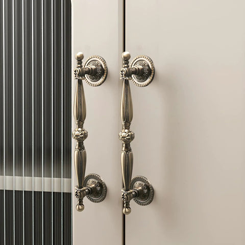 Kick Up Your Home Style With These Top Notch Five Inch Vintage Bronze Cabinet Pulls Crafted From Durable Zinc Alloy This Easy Install Drawer Handle Set Gives Your Kitchen Or Bathroom Hardware A Slick Upgrade That Really Delivers. Vintage bronze cabinet handles on a cream cabinet.