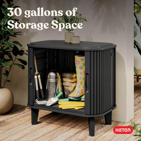 Velo 30 Gallon Outdoor Storage Cabinet with weather-resistant resin, steel reinforcement, lockable, wood look finish shown open with tools and boots.