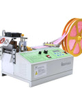 Automatic Webbing Cutter For Hot And Cold Cutting Of Ribbon And Zipper Tape with spool of pink ribbon in action