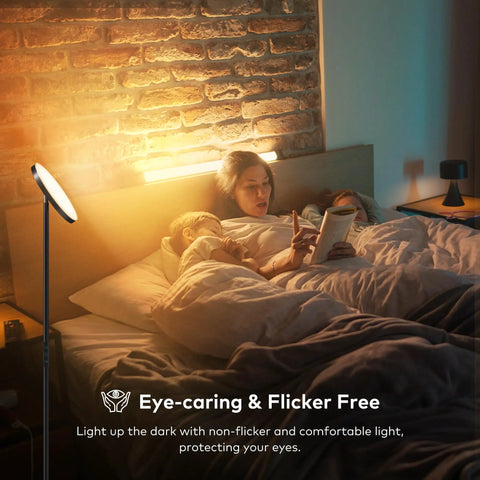 Game-Changing LED Floor Lamp With Remote Control lighting a cozy bedroom scene with family reading in bed, soft warm glow.