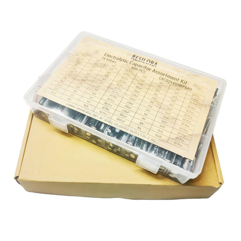 Dope Aluminum Electrolytic Capacitor Assortment Kit Loaded With 680 Pieces Over Twenty Four Values From Point One To One Thousand Microfarads Rated At Ten Volts Through Fifty Volts For Makers And Repair Crews in transparent storage case.