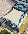 Beige 18x20 Foot Rectangle Sun Shade Sail Canopy For Patio Deck And Backyard Blocks Up To 95 Percent UV Heavy Duty 195GSM HDPE Fabric Not Waterproof D Ring Corners Outdoor Shade For Sun And Breeze installed over a patio