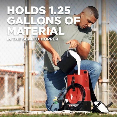 Man pouring paint into Tough As Nails 18V Cordless Airless Paint Sprayer With Advanced HEA Tech in backyard setting.