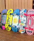 Colorful fingerboards with graphic prints, including Death Edition Pro Fingerboard Deck 32mm Five Layer Maple Wood with CNC trucks.