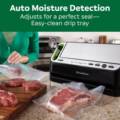 Heavy Duty 2 In 1 Vacuum Sealer Machine With Automatic Bag Detection And Starter Kit sealing meats on a kitchen counter.