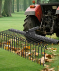 Heavy Duty Tow Behind Landscape Rake And Lawn Dethatcher With 21 Steel Tines And 60 Inch Wide Coverage attached to tractor