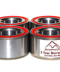 Heavy Duty Front And Rear Wheel Bearing Set For John Deere Gator Xuv Series, featuring four sealed units with red seals.