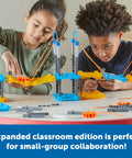 Children using STEM Explorers Bridge Builders Classroom Set For Kids 5 And Up 305 Piece Totally Hands On Engineering Kit to build a bridge