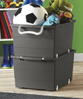 Smooth Rolling Storage Basket With Gray Plastic Mobile Organizer Bin featuring toys and a soccer ball, stacked with pivot wheels.