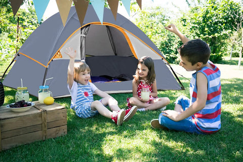 Ultra Lightweight 2 Person Camping Tent With Rainfly, Waterproof And Windproof Dome Shelter, Easy Setup in a backyard with kids playing