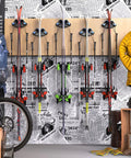 Sleek Ski Wall Mount And Snowboard Storage Rack For Garage Walls Featuring Scratch Guard Rubber Grips And Multi Pole Side Hooks For A Badass Winter Setup 1 Pack installed with skis, gear, and jacket.