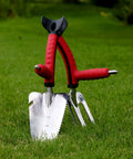 Multi Digger Dual Grip Garden Hand Trowel with Soft Touch Ergonomic Handles for yard soil work, showcasing dual grip design.