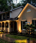 Brighten Your Outdoor Space With A 10 Pack Low Voltage LED Landscape Lights 7W 900LM Waterproof Garden highlighting house facade.