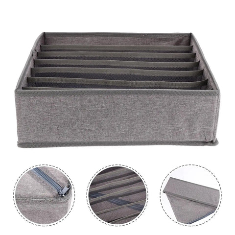 Slick Seven Compartment Folding Fabric Drawer Organizer For Underwear Socks And Hair Accessories To Quick Clean Up Your Bedroom Closet Space Without Any Sweat Or Hassle Today in gray with seven sections.