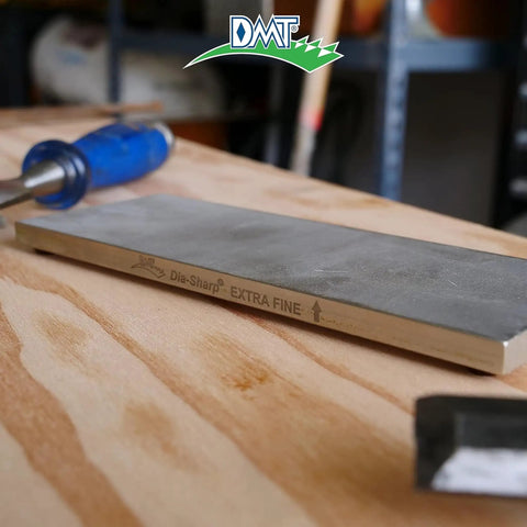 Dia Sharp Bench Stone Diamond Knife Sharpener with extra fine flat diamond surface in workshop setting, non slip base shown.